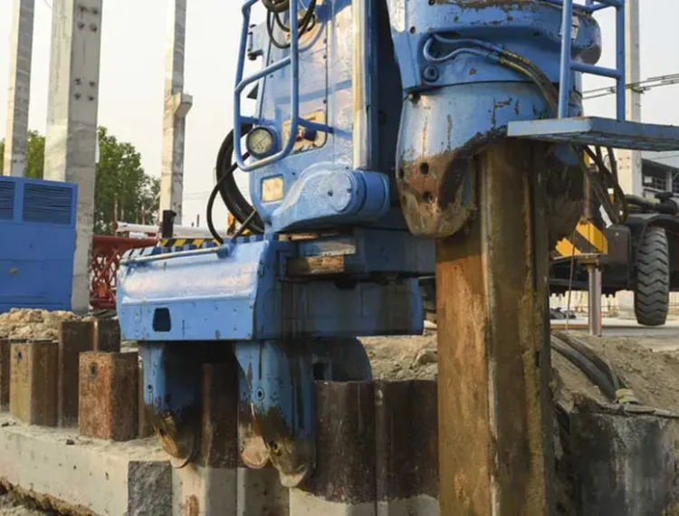 A hydraulic rig in action, installing a sheet pile